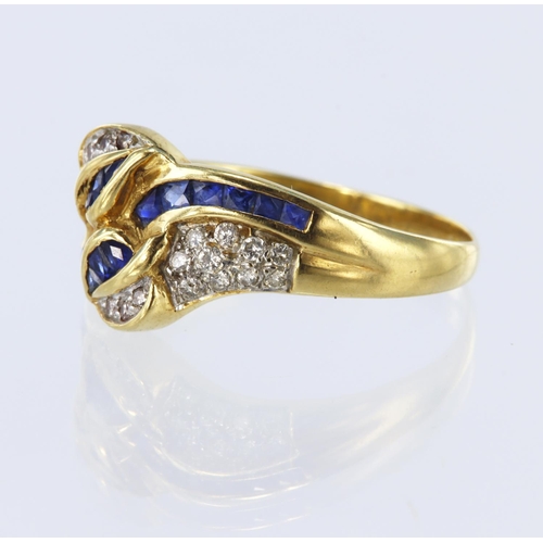 6 - 18ct yellow gold band ring featuring eighteen calibre cut sapphires in a channel setting, and twenty... 