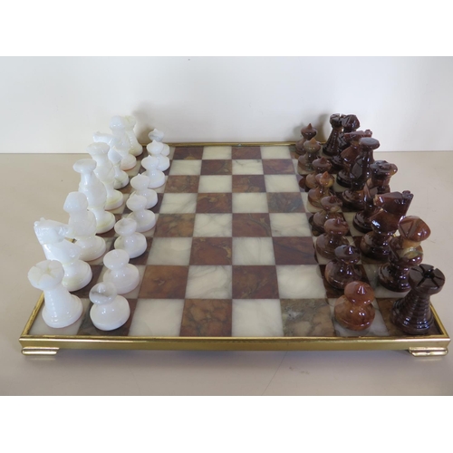 A Chiellini Italy alabaster chess set with complete set o... | Barnebys