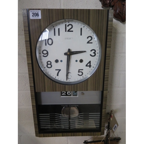 A Seiko 30 day time dater wall clock, 43c26cm - running | Barnebys