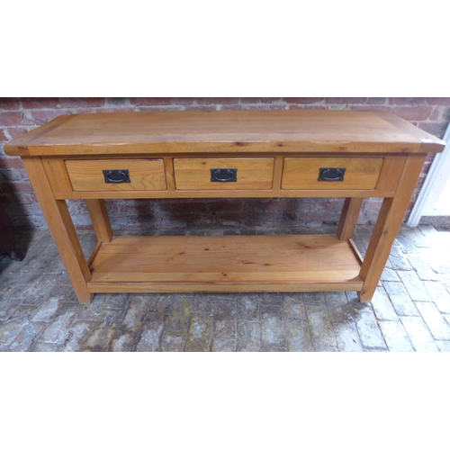 16 - A modern oak three drawer sideboard - Height 81cm x 150cm x 45cm
