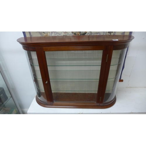 23 - A modern mahogany display cabinet with 3-glass shelves
61cm tall, 88cm x 21cm