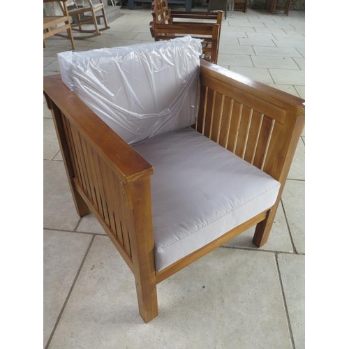 24 - A pair of hardwood garden chairs with cushions - boxed