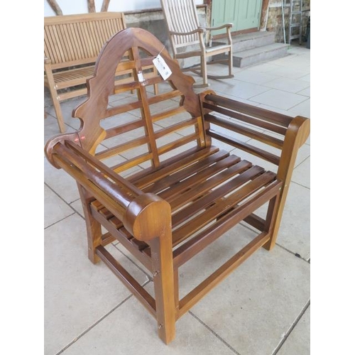 25 - A pair of hardwood garden chairs