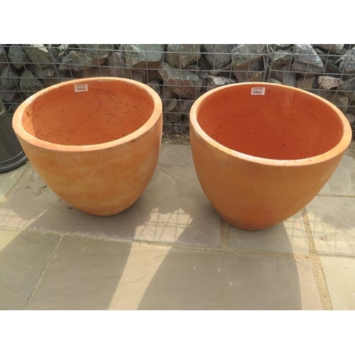 49A - A pair of terracotta plant pots 43cm high - retail at £39.95 each