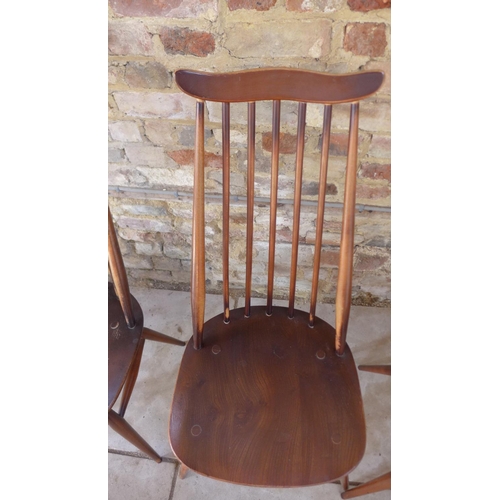10 - 4 x Ercol dining chairs 96cm tall, all have some movement to backs and some wear