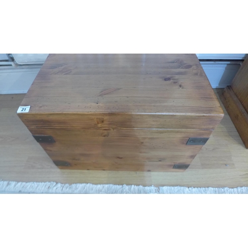 21 - A new pine metal banded box 38cm tall, 53 x 36cm