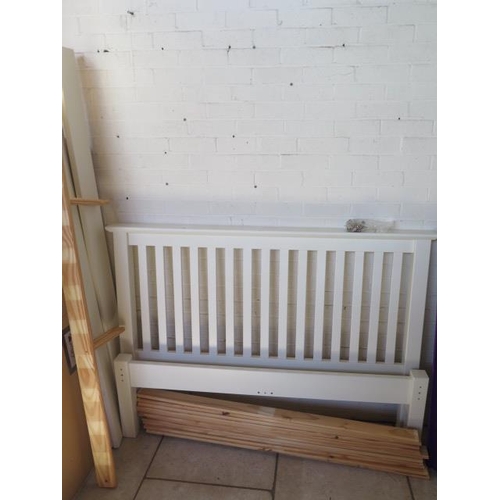 41 - A 5 foot cream double bed with slatted headboard
