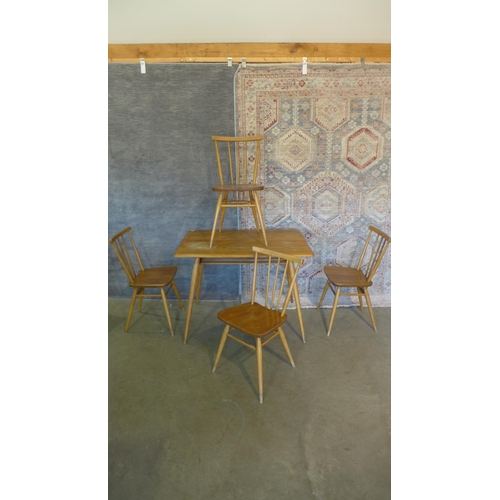 9 - An Ercol Elm table and 4 chairs. Table 73cm tall 99 x 68cm, chairs 80cm tall, all solid, all have sc... 