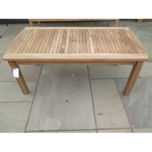 24 - A boxed teak coffee table, new and boxed, 120cm x 60cm