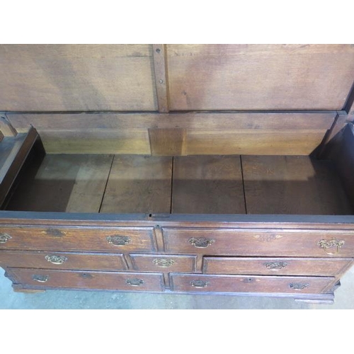 53 - A Georgian oak mule chest with a rising top and 2 top dummy drawers above 5 drawers, 160cm wide x 83... 