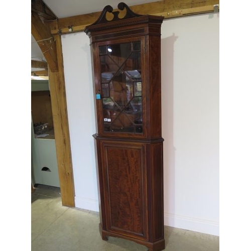 58 - A good quality Edwardian mahogany inlaid corner cupboard with a glazed top over a single door, split... 