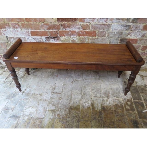 61 - A mahogany window seat on turned legs, 52cm tall, 129cm x 36cm, in sturdy condition