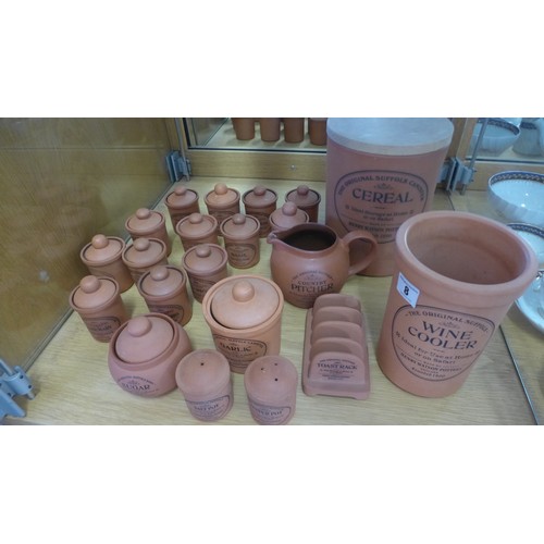 8 - A collection of The Original Suffolk Terracota kitchen ware including spice jars, 21 pieces in total