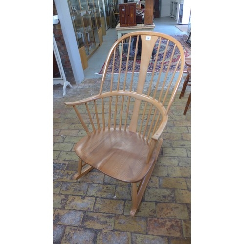 10 - An Ercol light elm rocking chair in good condition