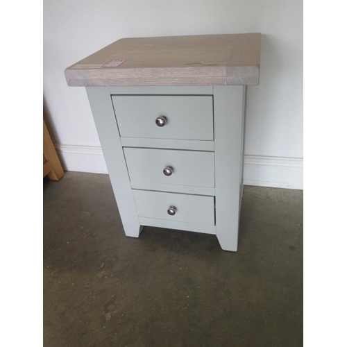 19 - A painted three drawer bedside chest with a chalked oak top, 62cm high x 47cm wide, ex-display as ne... 