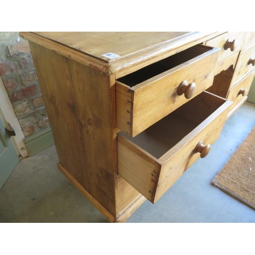 53 - A Victorian stripped, waxed and restored seven drawer dresser base, 88cm high x 152cm x 49cm