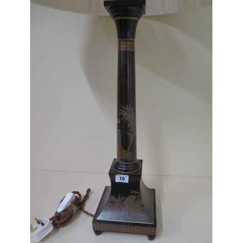 10 - A painted table lamp with a shade, 75cm tall