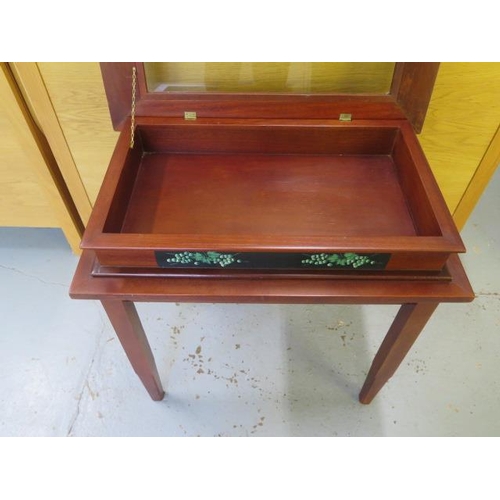 14 - A modern mahogany bijouterie display table 70cm tall x 70cm x 46cm, in good condition