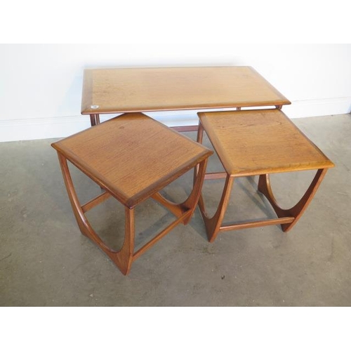 18 - A nest of three G plan side tables, 51cm tall x 99cm x 49cm, in generally good condition with some s... 