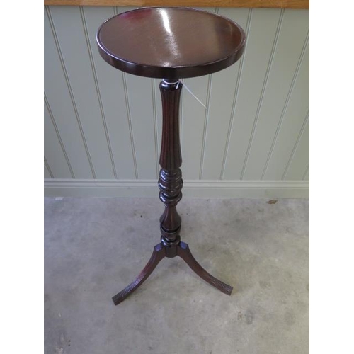 20 - A 20th century fluted and turned tripod plant stand in good polished condition