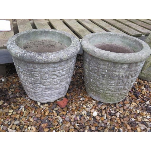 22 - A pair of stone effect garden planters, 32cm tall x 35cm wide