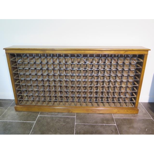 27 - A large burr oak 180 bottle wine rack made by a local craftsman to a high standard, 107cm tall x 205... 
