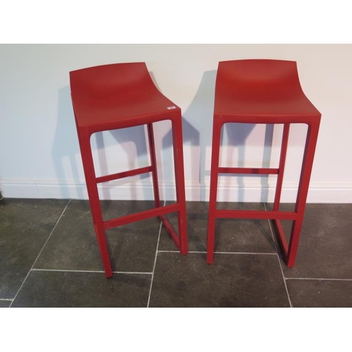 46 - A pair of Vondow Wall St by Eugeni Quitllet red moulded bar stools, 87cm tall x 39cm wide, for insid... 