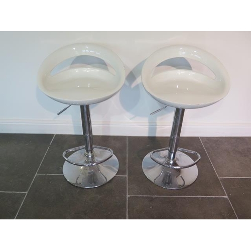 50A - A pair of gas lift bar stools with moulded seats,  some usage marks but working