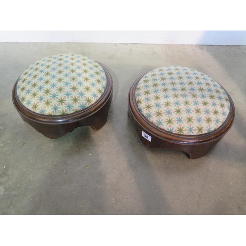 55 - A pair of Victorian footstools with woolwork covers, 12cm tall x 30cm diameter