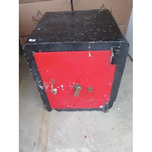 15 - A Vintage safe with key, 62cm tall x 54cm x 54cm