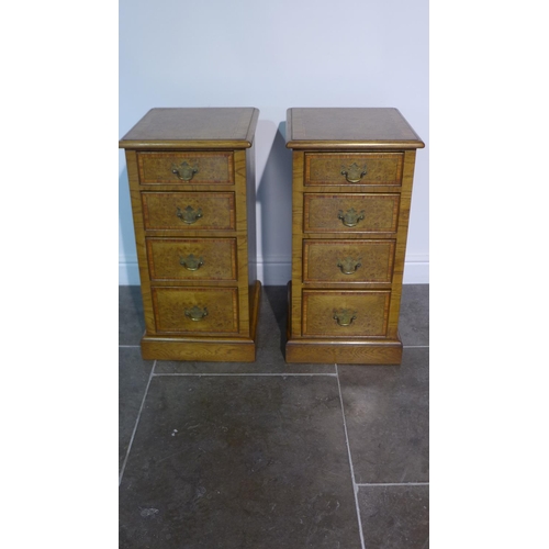 58 - A pair of burr oak four drawer bedside chests made by a local craftsman to a high standard incorpora... 
