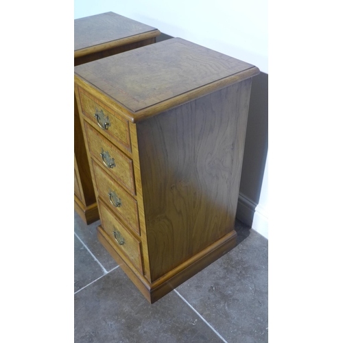 58 - A pair of burr oak four drawer bedside chests made by a local craftsman to a high standard incorpora... 