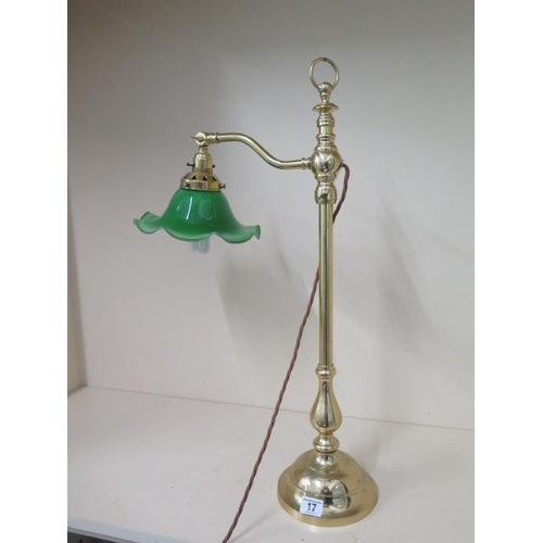 17 - A brass reading lamp with a green shade - Height 64cm - working
