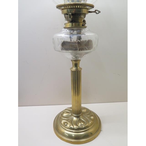 A brass oil lamp with an etched glass shade and Hinks no 2 burner and cut glass reservoir Height 6