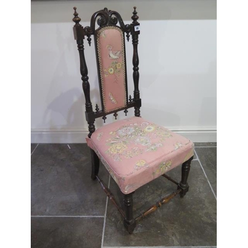 49 - An ornate Victorian mahogany parlour chair - in sturdy condition