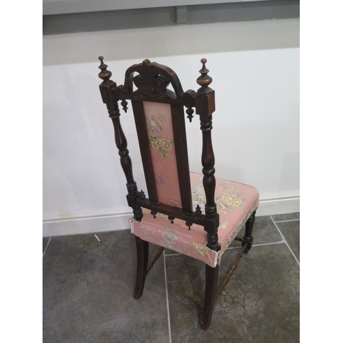 49 - An ornate Victorian mahogany parlour chair - in sturdy condition