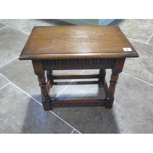 6 - A 17th century style carved oak joined stool in polished condition - Height 42cm x 48cm x 30cm
