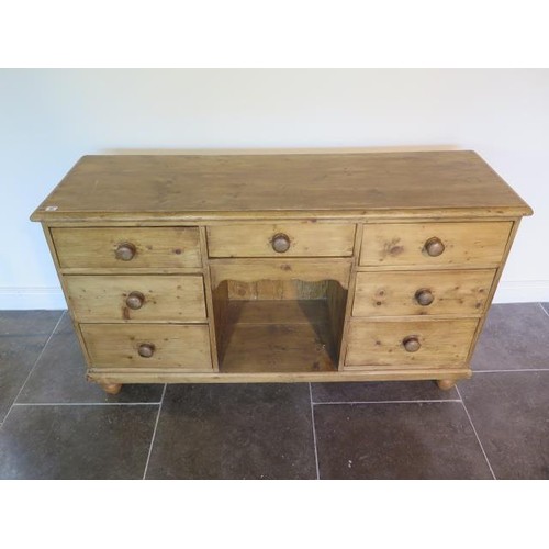 42 - A Victorian stripped pine seven drawer dresser in restored and waxed condition - Height 88cm x 152cm... 