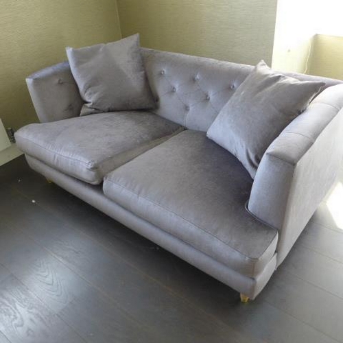 10C - A John Lewis two seater sofa - needs a replacement zip to one cushion