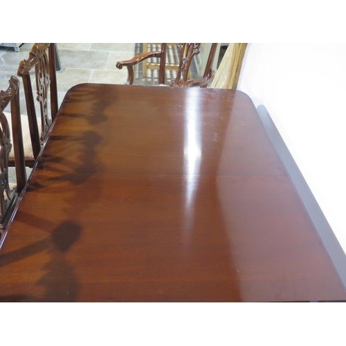 36 - A 19th century style pull out mahogany dining table with one leaf on turned reeded legs with six Chi... 