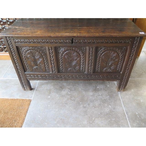 46 - An 18th century carved oak coffer with good patina - height 64cm x 113cm x 43cm