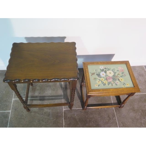 27 - A small oak coffee table with needlework panel under glass on baluster turned legs - height 47cm x t... 
