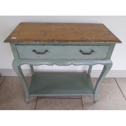 29 - A shabby chic painted side table with an oak top above a drawer and undertier, 92cm tall x 95cm x 45... 