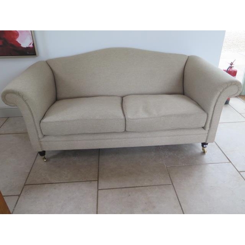 30 - A Laura Ashley oatmeal 2 seater sofa, 192cm wide x 86cm tall x 93cm deep, in good condition