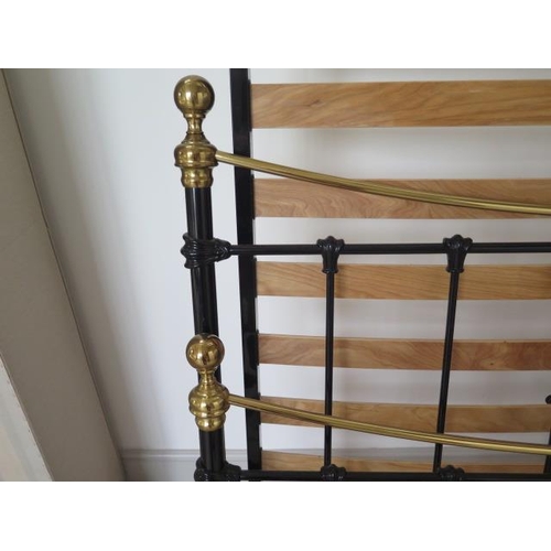 31 - A Feather and Black 5ft king size ' brass and metal Victorian style bed in good condition