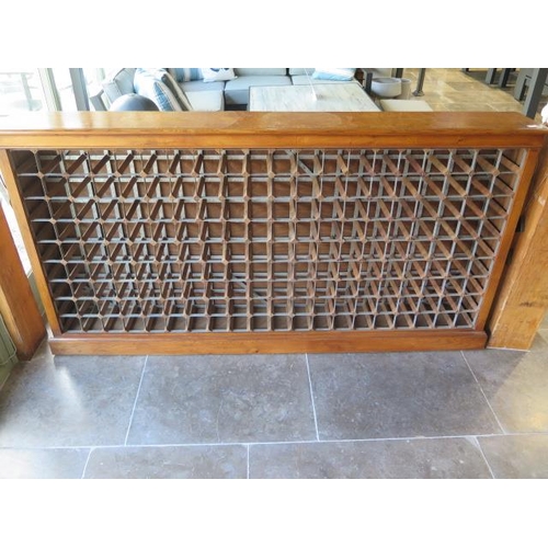 10A - A handmade walnut wine rack holding 190 bottles, 205cm wide x 108cm tall