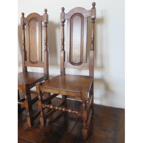34 - A good quality antique style oak draw leaf refectory style table with 12 high back oak chairs having... 