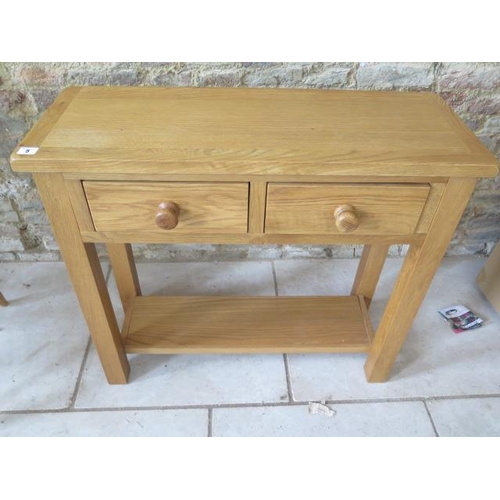 5 - An oak two drawer side table, 85cm wide