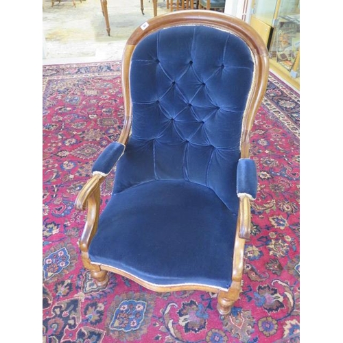 A Victorian mahogany upholstered button back scroll armchair, 103cm tall x 61cm wide, seat height 35cm