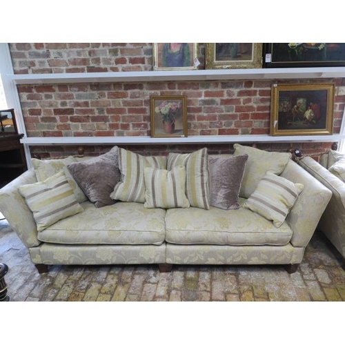 1 - A pair of knolle type country house four seater sofas with scatter cushions each in two pieces for e... 